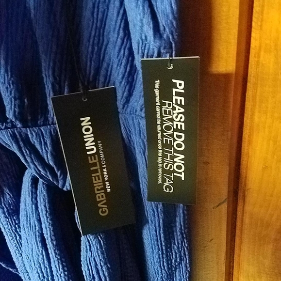 Sleeveless wrap dress - Picture 11 of 12